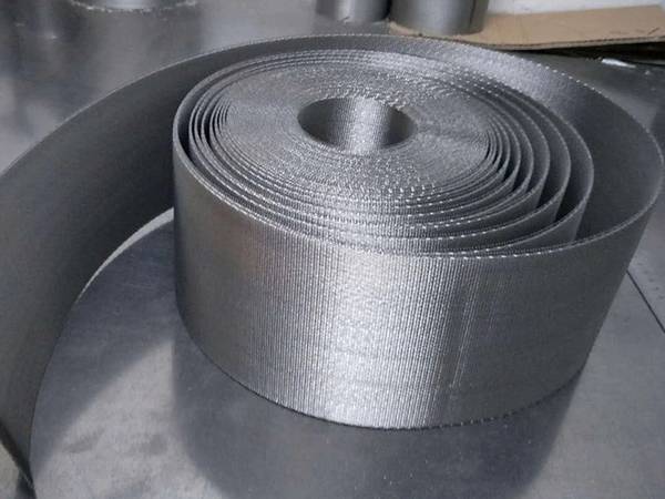 A roll of reverse dutch continuous filter belts on the table.