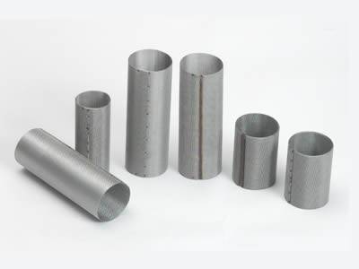 Six cylindrical extruder screens with spot welded edge in different size