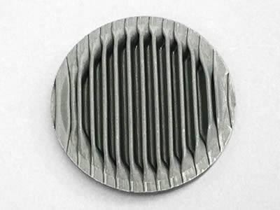 There is a pleated extruder disc without rim.