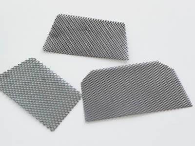 There are three rectangle expanded metal extruder screen sheets.