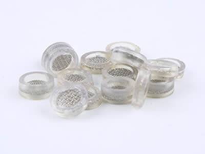 There are several tiny rubber framed extruder discs.