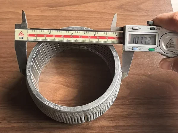 The outer diameter of the textile filter element is 107.72 mm.