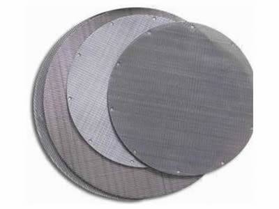 Four woven wire cloth screens in round shape on white background